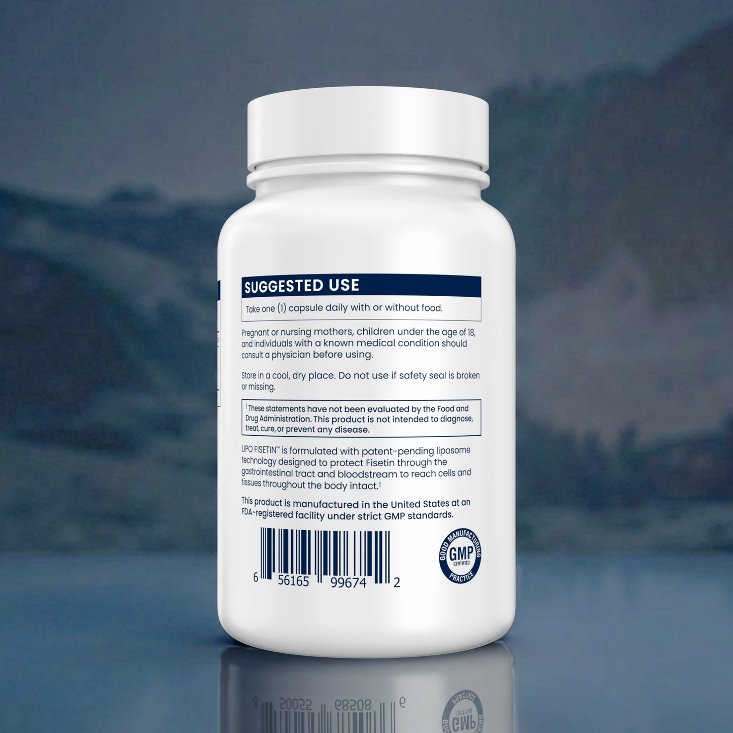 Tall white container with label on a blurred natural background